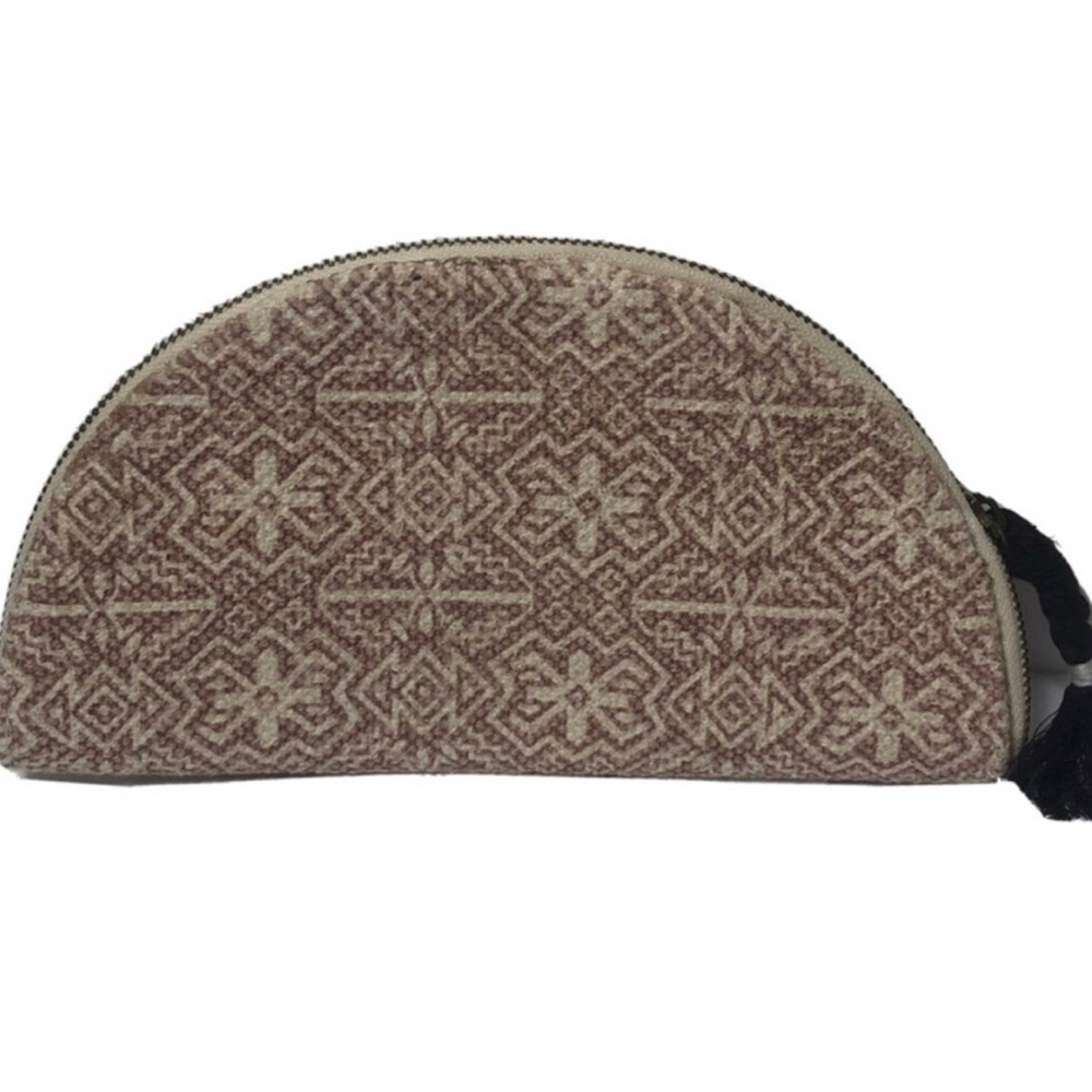 Universal Threads aztec style tassel zip around taupe clutch.